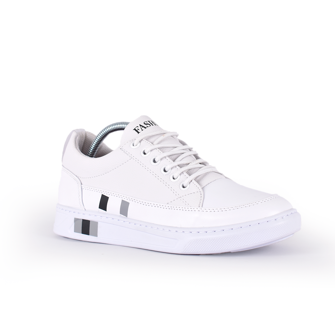 Tenis urbanos Flat Pro en material sintético con suela spansor y plantilla Eva anatómica. Cómodos, livianos y perfectos para uso diario en Colombia.